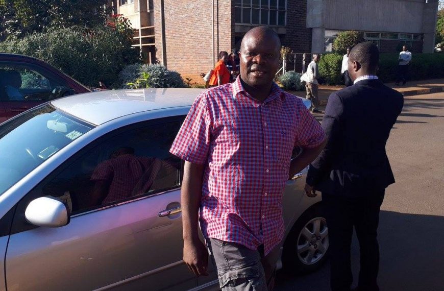 Amos Chibaya distributing mealie-meal in Mukoba (PIC via: Amos Chibaya)