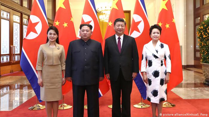 North Korea ruler Kim Jong-un and Chinese supremo Xi Jinping Privacy Law