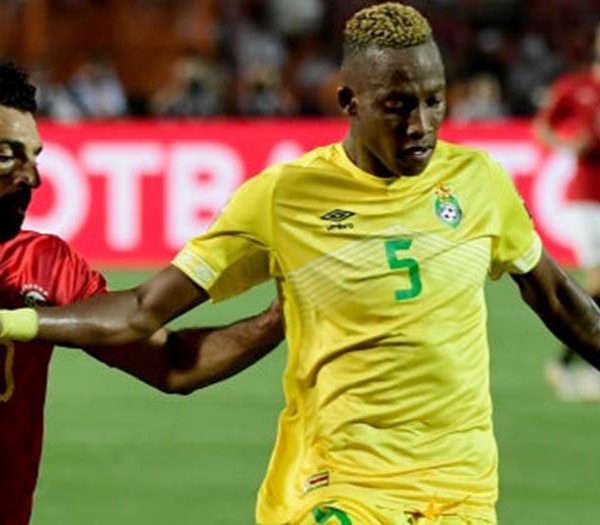 Zimbabwe defender Divine Lunga tussling for the ball against Egyptian forward Mohammed Salah at AFCON 2017 in Alexandre, Egypt