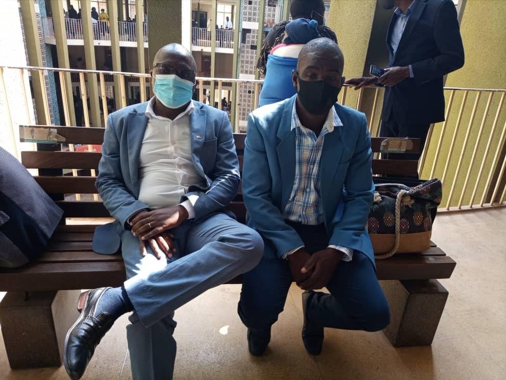 Transform Zimbabwe leader Jacob Ngarivhume (left) at court for trial