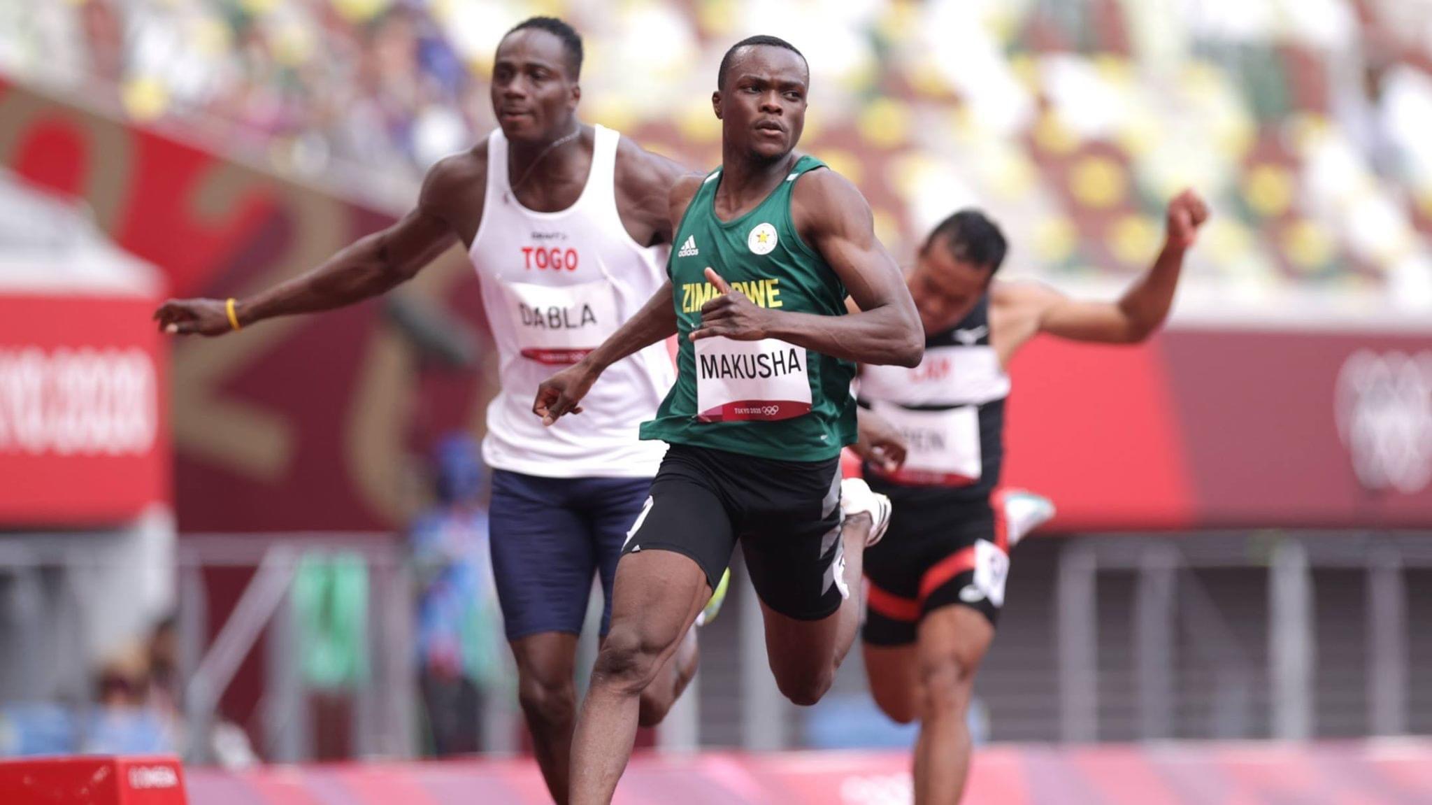 Ngoni Makusha (left) going through the 100m race at Tokyo Olympics 2020 in Japan (Picture via: Getty Images)