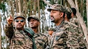 Ethiopian general of the Ethiopian National Defense Force Abebaw Tadesse and Prime Minister Abiy Ahmed.