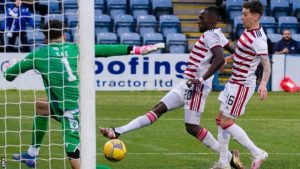 David Moyo (centre) scored his fifth goal of the season [Picture: SNS]