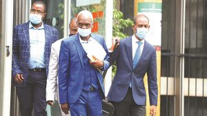 Home 6 Felton Kamambo and crew leaving court in December 2021 after attending a trial in a bribe case.