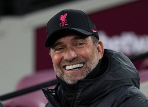 Liverpool manager Jurgen Klopp smiling for the camera at the Anfield stadium recently.
