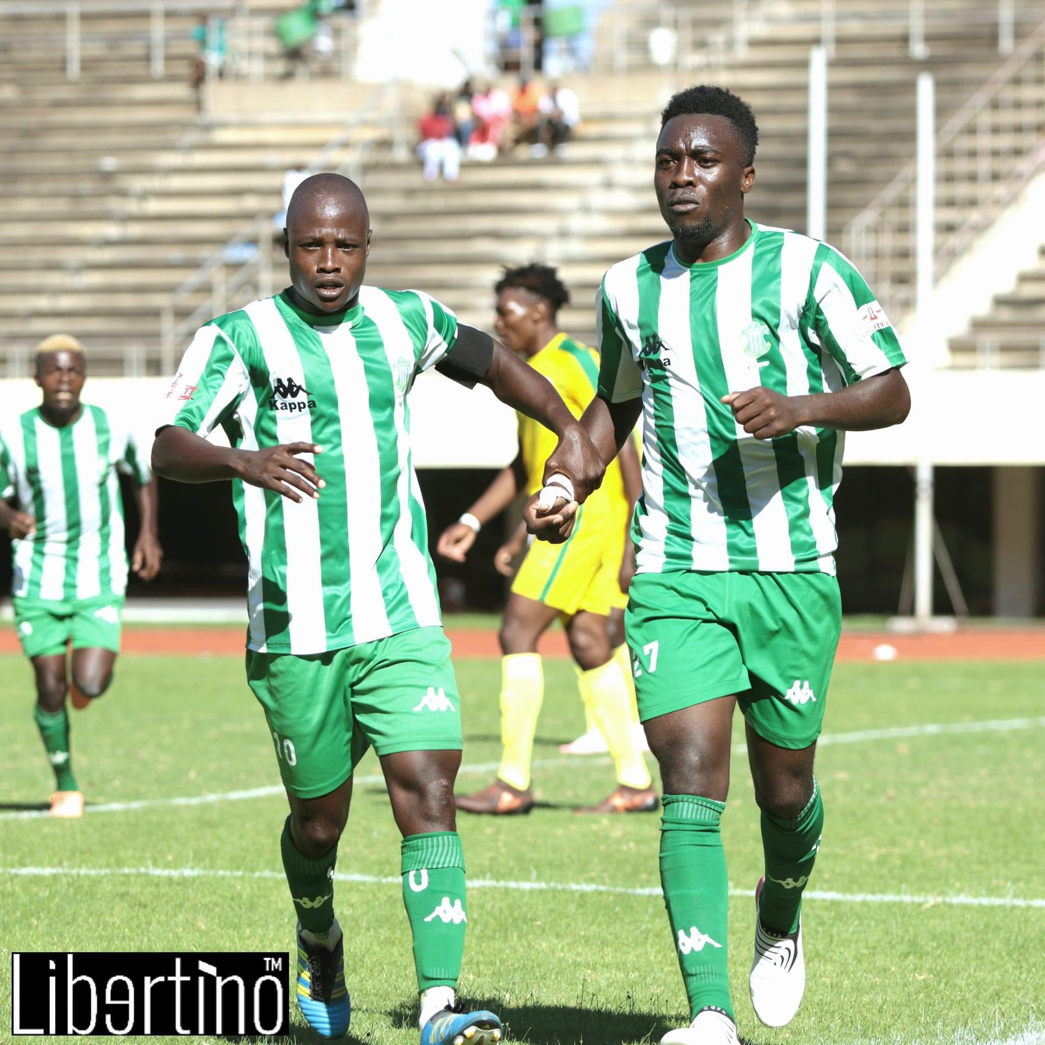 CAPS United players Ronald Chitiyo and William Manondo celebrating a goal against WhaWha