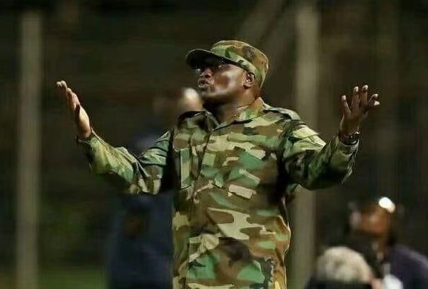 Lucky Nelukau, coach of Tshakuma Tsha Madzivandila, came clad in military gear for a match