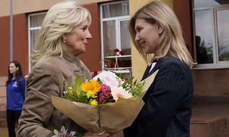 Jill Biden greets Olena Zelenskiy, Ukrain’s first lady, outside of School 6, in Uzhhorod, Ukraine, on Sunday. Photograph: Susan Walsh/AP