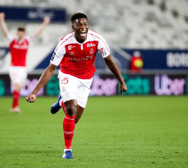 Home 162 Stade de Reims midfielder Marshall Munetsi celebrating after scoring a goal in a French League 1 match.