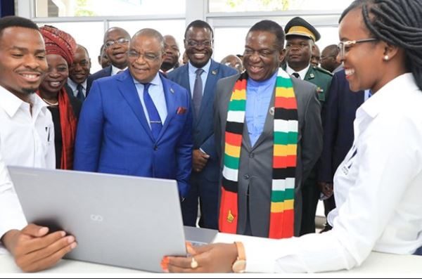 Zimbabwe President Mnangagwa and Netone Group Chief Operating Officer Jeremiah Munembe