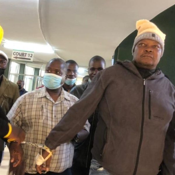 Citizens Coalition for Change (CCC) members of parliament Godfrey Sithole and Job Sikhala in handcuffs at court.