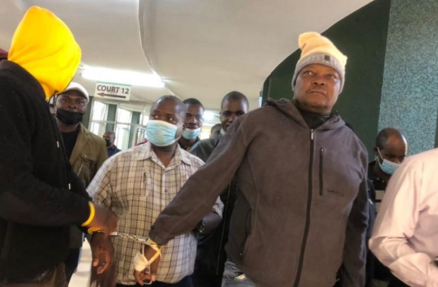 Citizens Coalition for Change (CCC) members of parliament Godfrey Sithole and Job Sikhala in handcuffs at court.