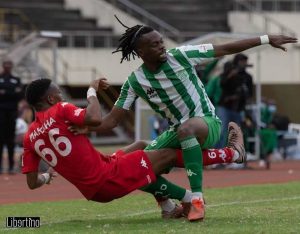 Home 6 CAPS United winger Emmanuel Mandiranga tussle for the ball with Yadah Stars player Peace Makaha in a Castle Lager Premier League match at the National Sports Stadium.