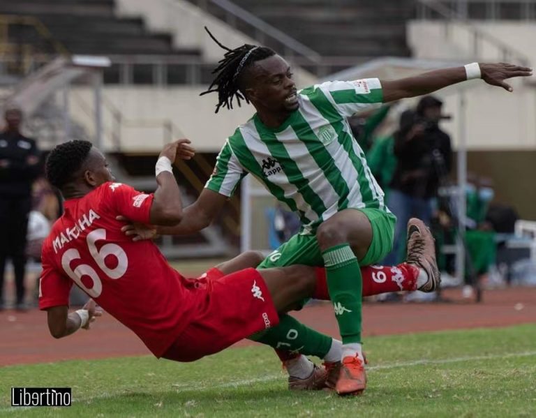 CAPS United winger Emmanuel Mandiranga tussle for the ball with Yadah Stars player Peace Makaha in a Castle Lager Premier League match at the National Sports Stadium.