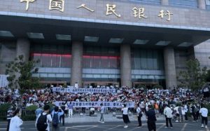 China central bank cut interest rates to boost economy hit by zero-COVID policy