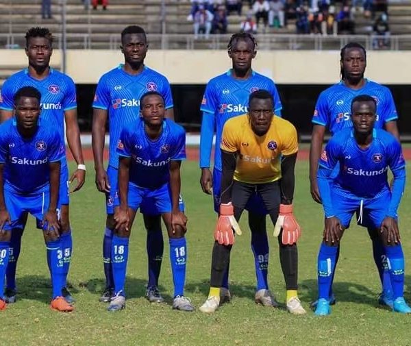 Castle Lager Premier League club Dynamos squad posing for a team photo before a match at the National Sports Stadium recently.
