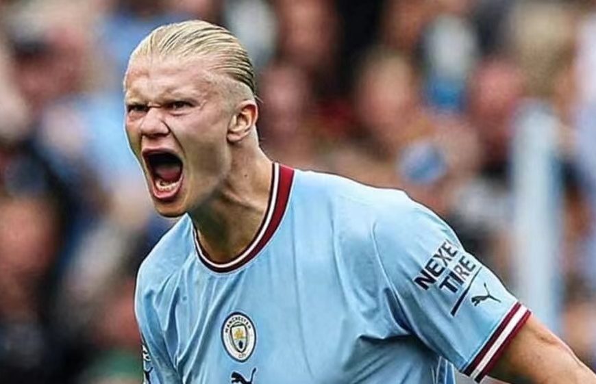 Erling Haaland celebrates after scoring his first Premier League hat-trick to inspire Manchester City's comeback 4-2 victory against Crystal Palace on Saturday.