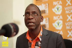 National Constitutional Assembly President Lovemore Madhuku addressing reporters at a news conference in Harare.