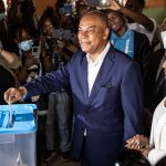 Angola opposition leader Adalberto Costa Junior casts his ballot at a polling station in Luanda on August 24.