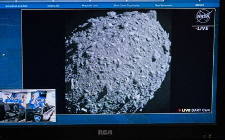 A television at NASA Kennedy Space Center in Cape Canaveral, Florida, captures the final images from the Double Asteroid Redirection Test (DART) just before it smashes into the asteroid Dimorphos on September 26, 2022.