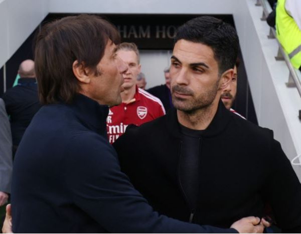 Arsenal manager Mikel Arteta and Tottenham boss Antonio Conte greeting on the touchline at Tottenham Hotspur Stadium last season.