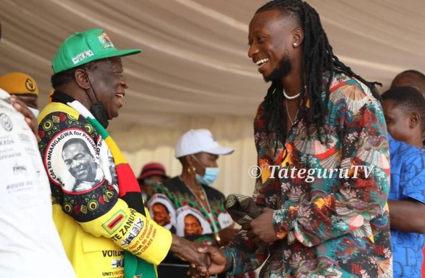 Jiti star Baba Harare sharing a lighter moment with Zanu PF leader Emmerson Mnangagwa at the party's Thank You rally in Mutasa South Constituency.