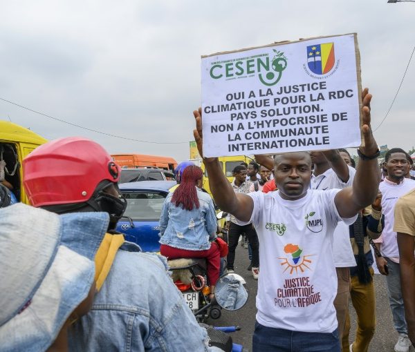 An environment protester in Kinshasa accuses the world of climate 'hypocrisy'.