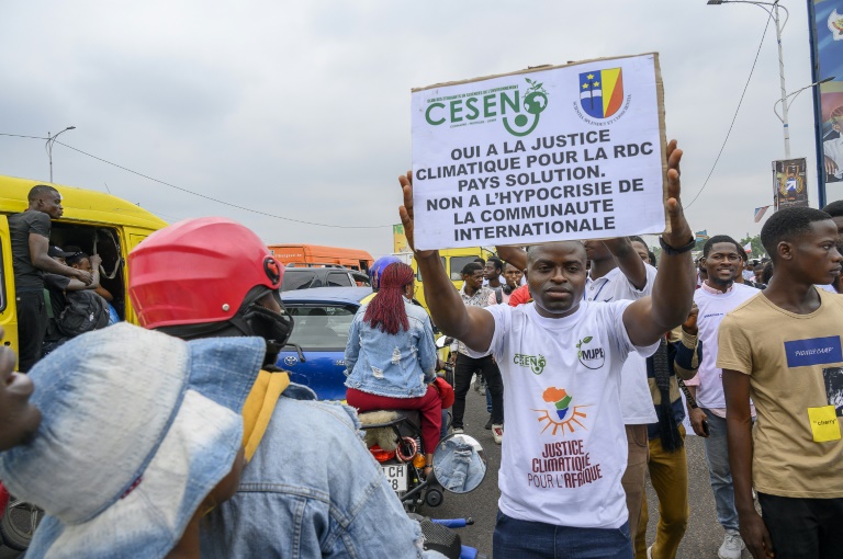An environment protester in Kinshasa accuses the world of climate 'hypocrisy'.