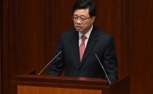 Home 5 Hong Kong's Chief Executive John Lee delivers his first policy address at the government headquarters in Hong Kong on 19 October 2022.