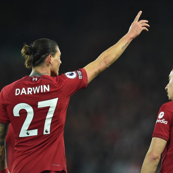 Liverpool players celebrate a goal in their English Premier League match against West Ham United on 19 October 2022.