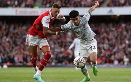 Arsenal defender Ben White (L) vies with Liverpool midfielder Luis Diaz during the English Premier League football match between Arsenal and Liverpool at the Emirates Stadium in London on 9 October 2022.