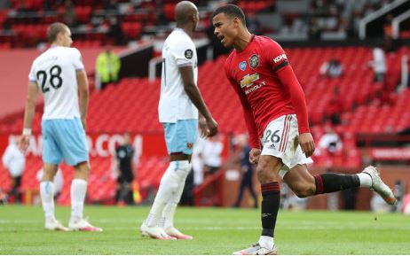 Manchester United striker Mason Greenwood celebrates after scoring the equalising goal during the English Premier League football match between Manchester United and West Ham United at Old Trafford in Manchester, north west England, on 22 July 2020.