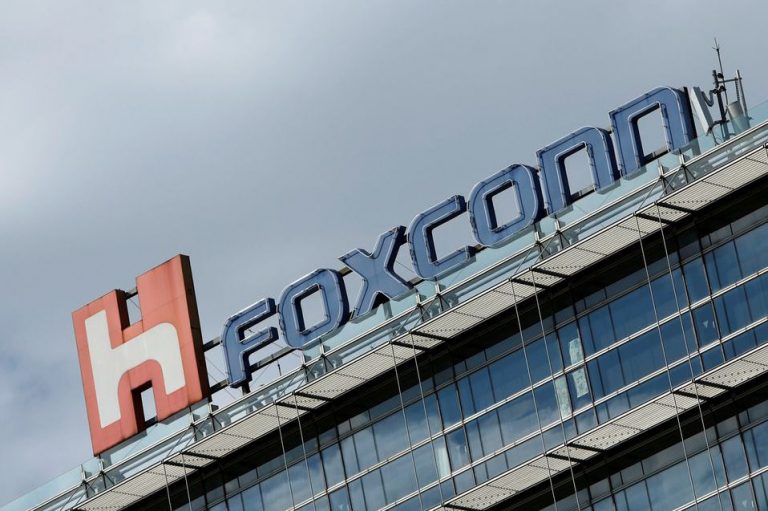 The logo of Apple Inc's Foxconn, the trading name of Hon Hai Precision Industry, is seen on top of the company's building in Taipei, Taiwan March 30, 2018.