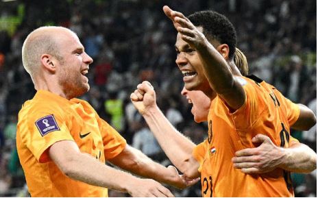Netherlands players celebrate a goal in their Group A Fifa World Cup match against Senegal in Doha on 21 November 2022.