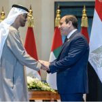UAE President Sheikh Mohamed bin Zayed al-Nahyan (L) and Egypt's President Abdel Fattah el-Sisi (R) shaking hands after a ceremony to sign a memorandum of understanding.