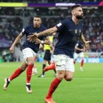 France record goalscorer Olivier Giroud and Kylian Mbappe celebrating a goal during a FIFA World Cup 2022 match in Qatar.