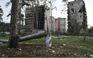 This photograph taken on 23 December 2022 shows heavily damaged residential buildings in Irpin, northwest of Kyiv, amid the Russian invasion of Ukraine.