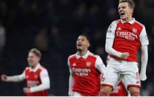 Arsenal players celebrate their win over Tottenham in their English Premier League match on 15 January 2023.