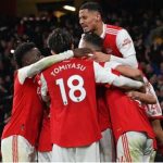 Arsenal striker Eddie Nketiah celebrates with teammates after scoring their third goal during the English Premier League football match between Arsenal and Manchester United at the Emirates Stadium in London on 22 January 2023.