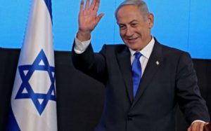 FILE: Israel's ex-premier and leader of the Likud party Benjamin Netanyahu addresses supporters at campaign headquarters in Jerusalem early on 2 November 2022, after the end of voting for national elections.