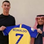 Cristiano Ronaldo smiling at his unveiling after joining Al Nassr of Saudi Arabia.