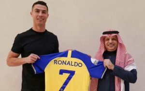 Cristiano Ronaldo smiling at his unveiling after joining Al Nassr of Saudi Arabia.