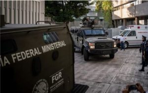 Armoured vehicles leave the Attorney General's Office for Special Investigations on Organised Crime in Mexico City, on January 5, 2023, after the arrest of Ovidio Guzman - son of drug lord El Chapo.