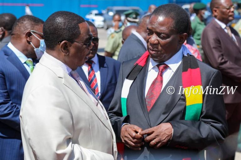 Zimbabwe President Emmerson Mnangagwa and Vice President Constantino Chiwenga chatting at the Robert Mugabe International Airport before the former's departure for Equatorial Guinea
