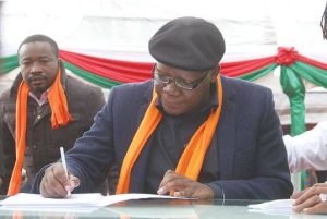 Home 6 Opposition figure Tendai Biti (then PDP leader) signing a pact agreement at the MDC Alliance principal event.