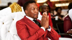 Zimbabwe's ambassador-at-large Uebert Angel during a prayer session at his church