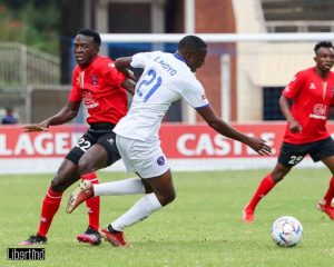 Dynamos player Elvis Moyo works his way past Sheasham players during the Castle Lager Premier League match played at the National Sports Stadium on Sunday 26th March 2023.