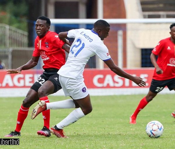 Dynamos player Elvis Moyo works his way past Sheasham players during the Castle Lager Premier League match played at the National Sports Stadium on Sunday 26th March 2023.