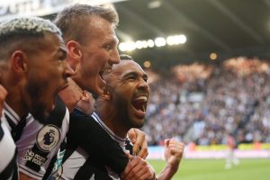 Home 7 FILE: Newcastle United players celebrate the team's second goal during the Premier League match between Newcastle United and Manchester United at St. James Park on April 02, 2023 in Newcastle upon Tyne, England.