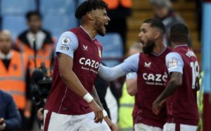 Home 5 Aston Villa's Tyrone Mings (foreground) celebrates his goal against Fulham in their English Premier League match on 25 April 2023.